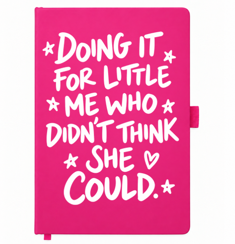 Pink A5 notebook reading Doing It for Little Me Who Didn't Think She Could