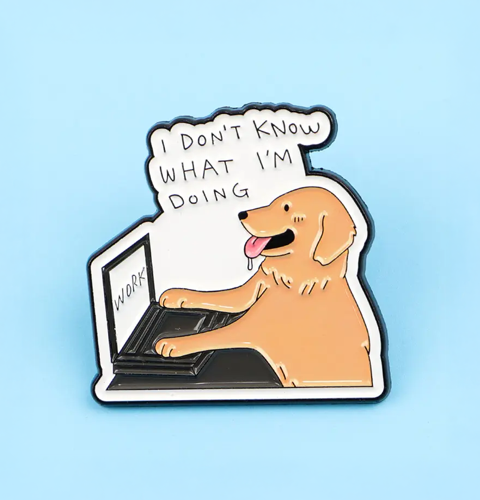 Sticker of a dog using a laptop with text 'I Don't Know What I'm Doing' on a blue background