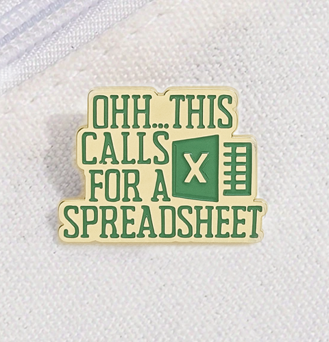 Enamel pin with text 'Ohh... This calls for a spreadsheet' on a white background