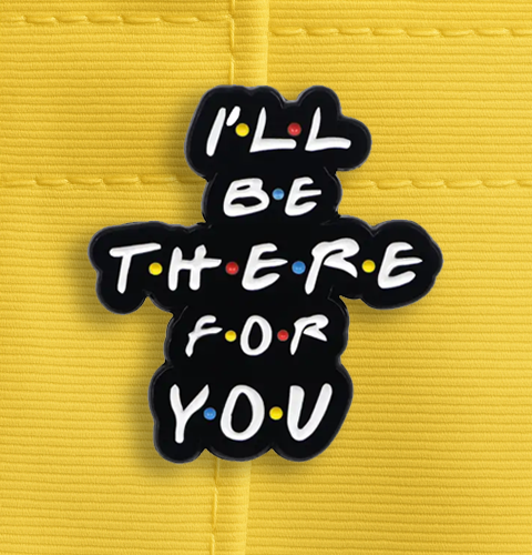 Black patch with 'I'll be there for you' text on a yellow background