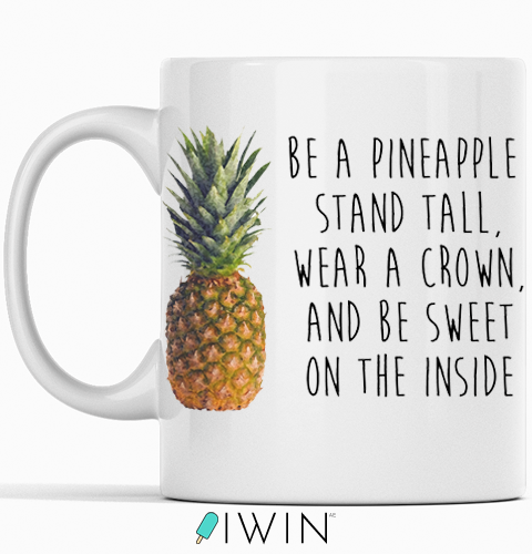 White mug featuring a pineapple and motivational quote