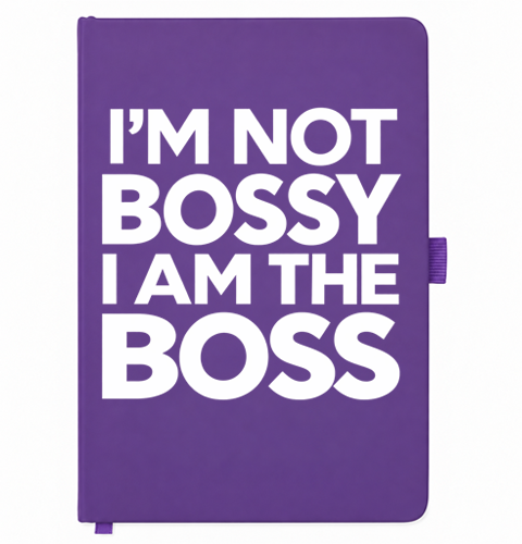 Purple A5 notebook reading I'm not bossy I am the boss